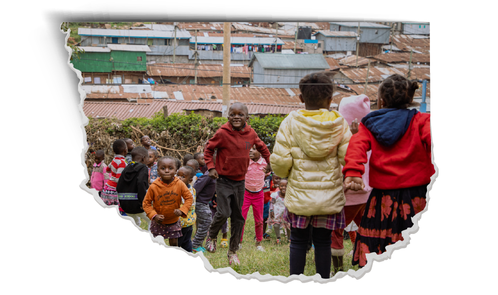 Children participating in outdoor Kids Club activities in a community outreach program.